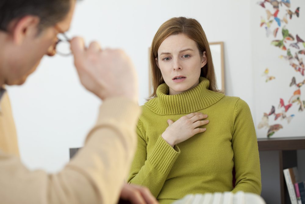 Counseling Session for Alcohol Recovery Support Woman speaking with counselor during alcohol recovery